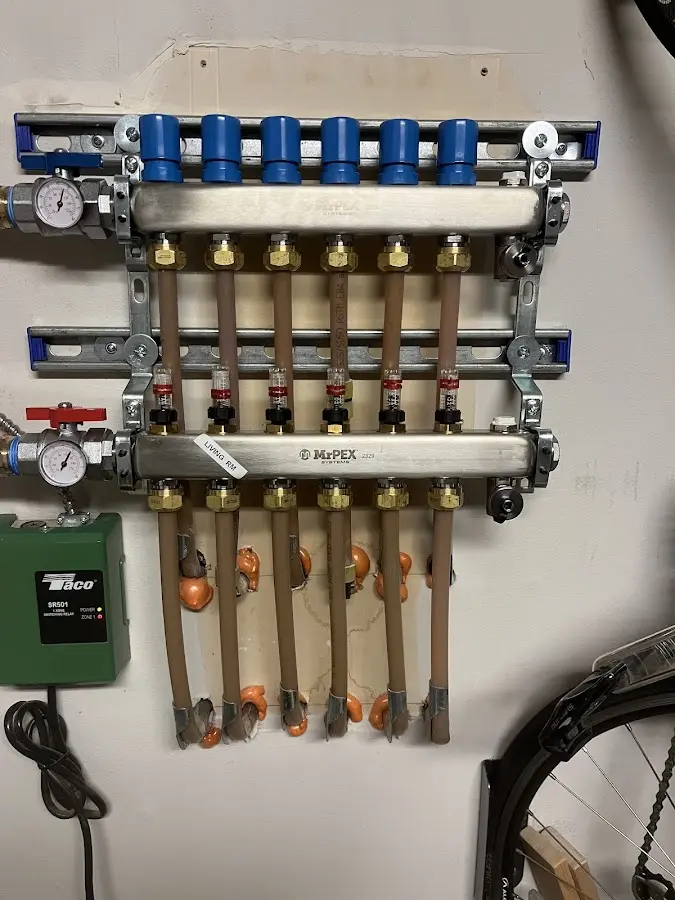 Plumber performing Sink Repair at a residential property in Island Park